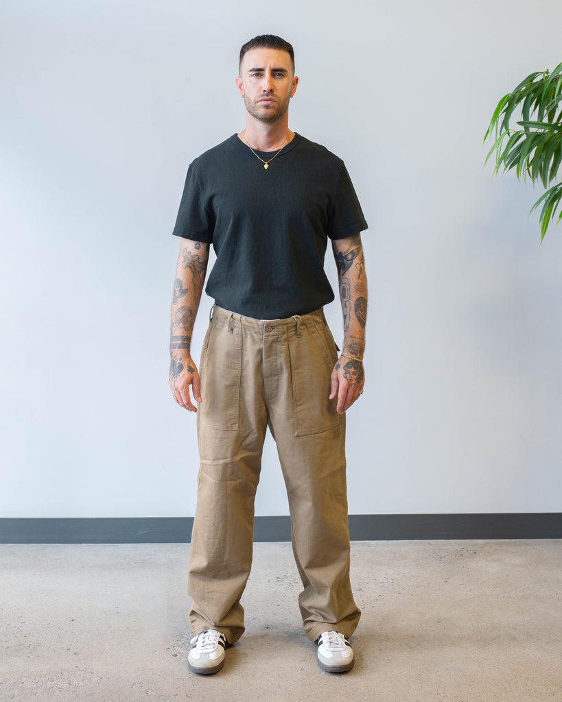 Engineered Garments Fatigue Pant Khaki/Blue PC Iridescent Heavy Twill on model